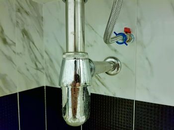 Close-up of water pipe in bathroom