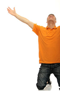 Man looking at camera over white background