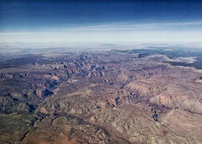 High angle view of rock formations against sky