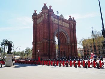 Group of people in front of historical building