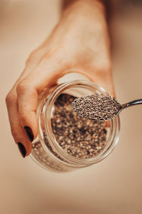 Close-up of hand holding ice cream