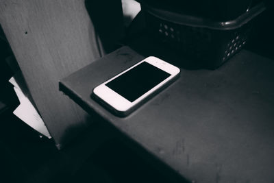 Close-up of smart phone on table