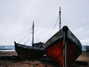 Ship in water against sky