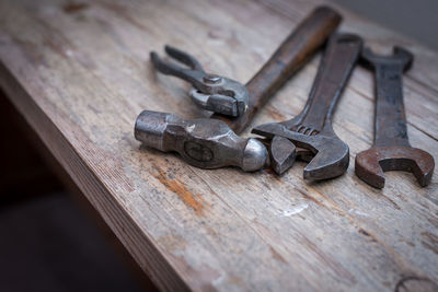 Close-up of rusty metal on table