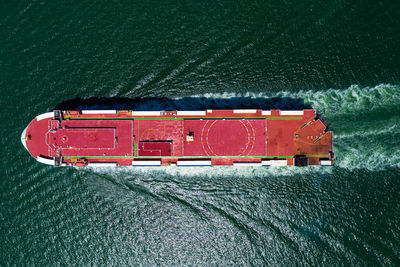 High angle view of red ship on sea