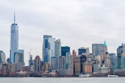 Buildings in city against sky