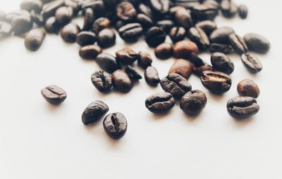 Close-up of coffee beans on table