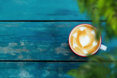 Directly above shot of cappuccino on table