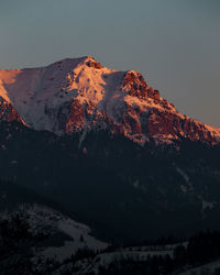 Bucegi mountains seen from the city of bran, romania. beautiful winter landscape. 