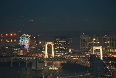 Illuminated cityscape at night