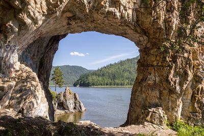 Scenic view of rock formation amidst trees