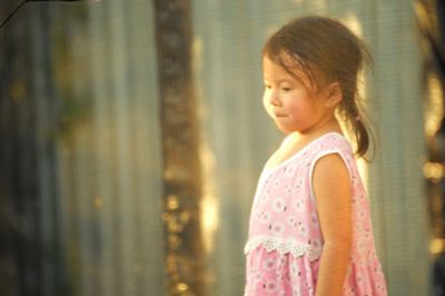 Cute girl looking away outdoors