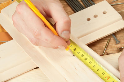 Close-up of man working on table