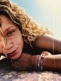 Close-up portrait of young man wearing sunglasses
