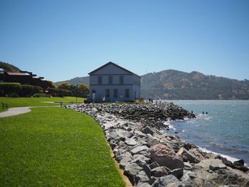 Scenic view of calm sea against clear sky