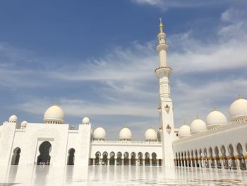 Historic mosque building against sky