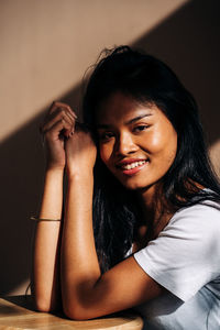 Portrait of a smiling young woman