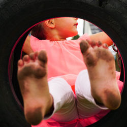 Close-up of cute girl with pink face