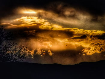 Scenic view of dramatic sky during sunset