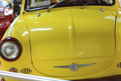 Close-up of yellow car