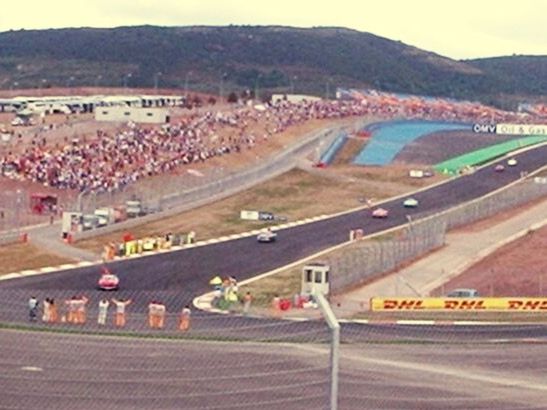 HIGH ANGLE VIEW OF CARS ON ROAD