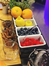 High angle view of fruits in container on table
