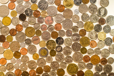 High angle view of coins on floor