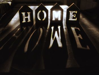 Illuminated text at night