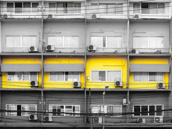 Full frame shot of yellow train on building