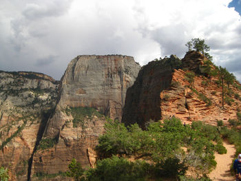 Low angle view of rock formations against sky