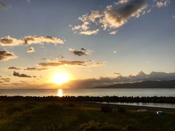 Scenic view of sea against sky during sunset