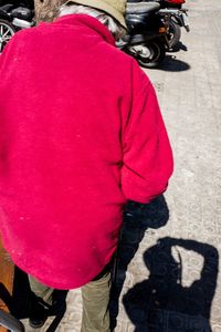 Low section of people standing on street