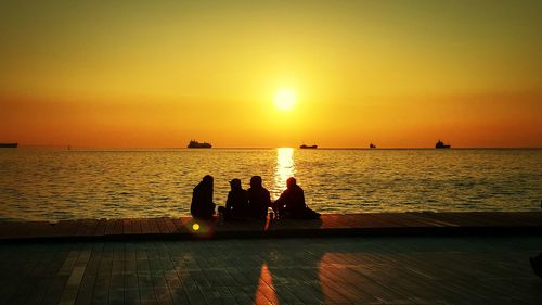 Scenic view of sea at sunset