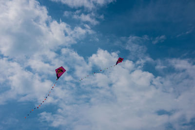 Low angle view of flag against sky