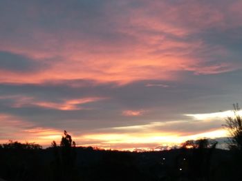 Scenic view of dramatic sky during sunset