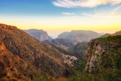 Scenic view of mountains against sky during sunset