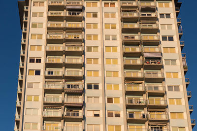 Low angle view of apartment building against sky