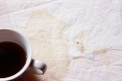 Close-up of coffee cup on table