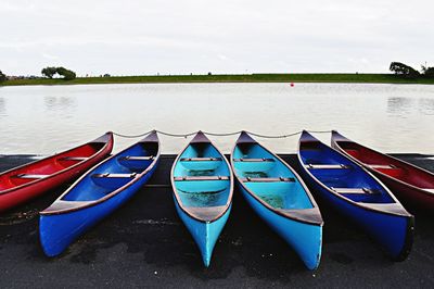 Boats moored in sea