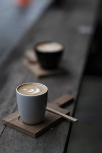 High angle view of coffee cup on table