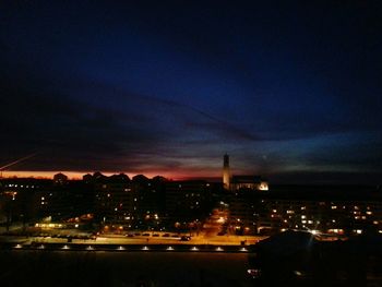 Illuminated cityscape at night