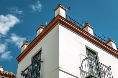 White building on a sunny day in seville, andalusia, spain