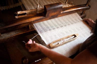 Close-up of woman weaving