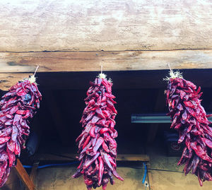 Clothes drying on rope for sale at market stall