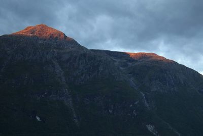 Scenic view of volcanic mountain against sky