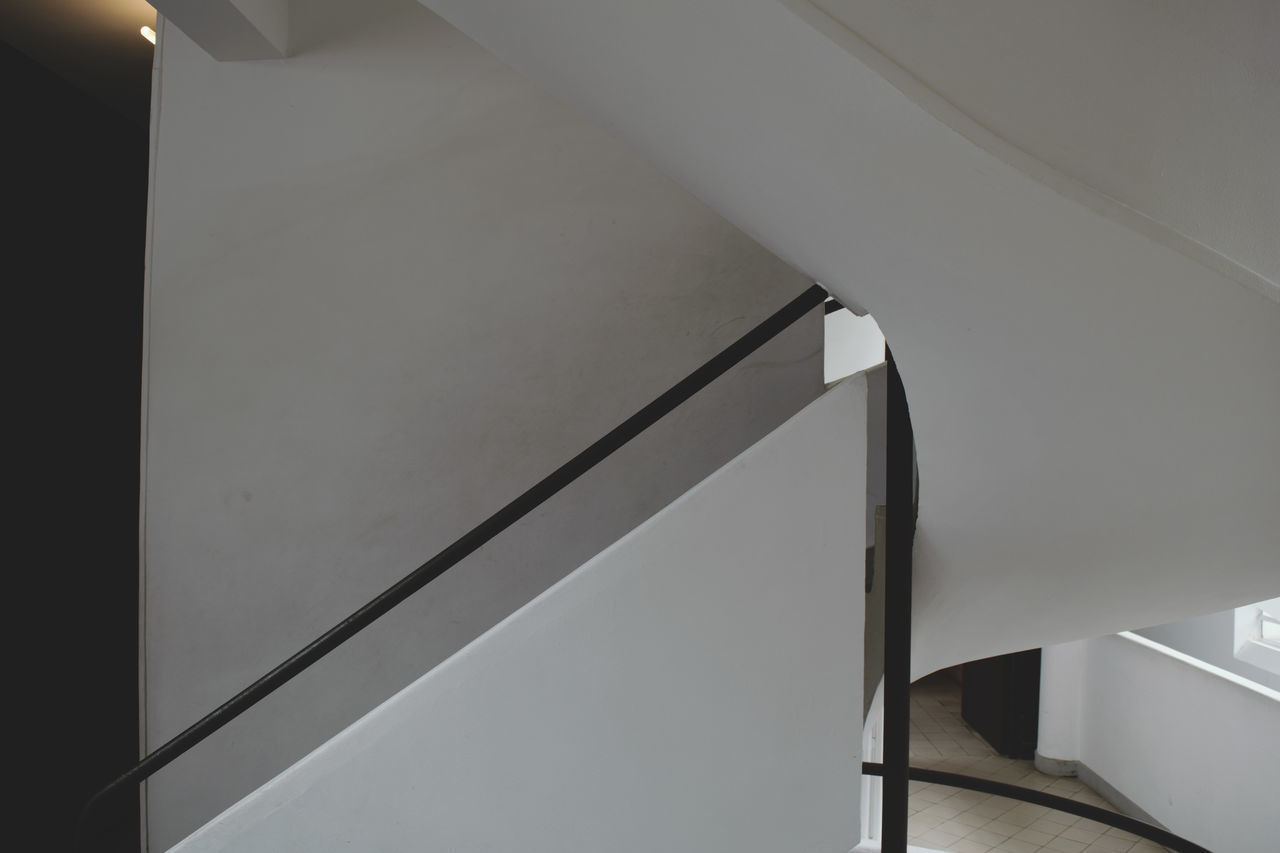 CLOSE-UP OF SPIRAL STAIRCASE