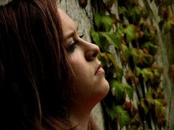 Close-up side view of young woman