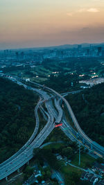 High angle view of light trails on road in city