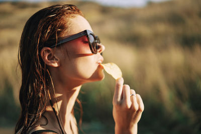 Young woman wearing sunglasses