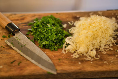 High angle view of chopped vegetables on cutting board